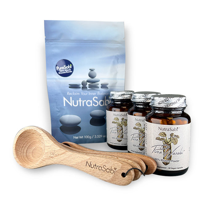NutraSabé products including powders and capsules with a wooden scoop on a white background.